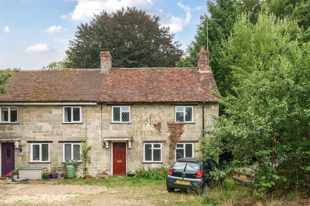 Lot: 156 - END-TERRACE COTTAGE FOR IMPROVEMENT - View of end-terrace cottage from road
